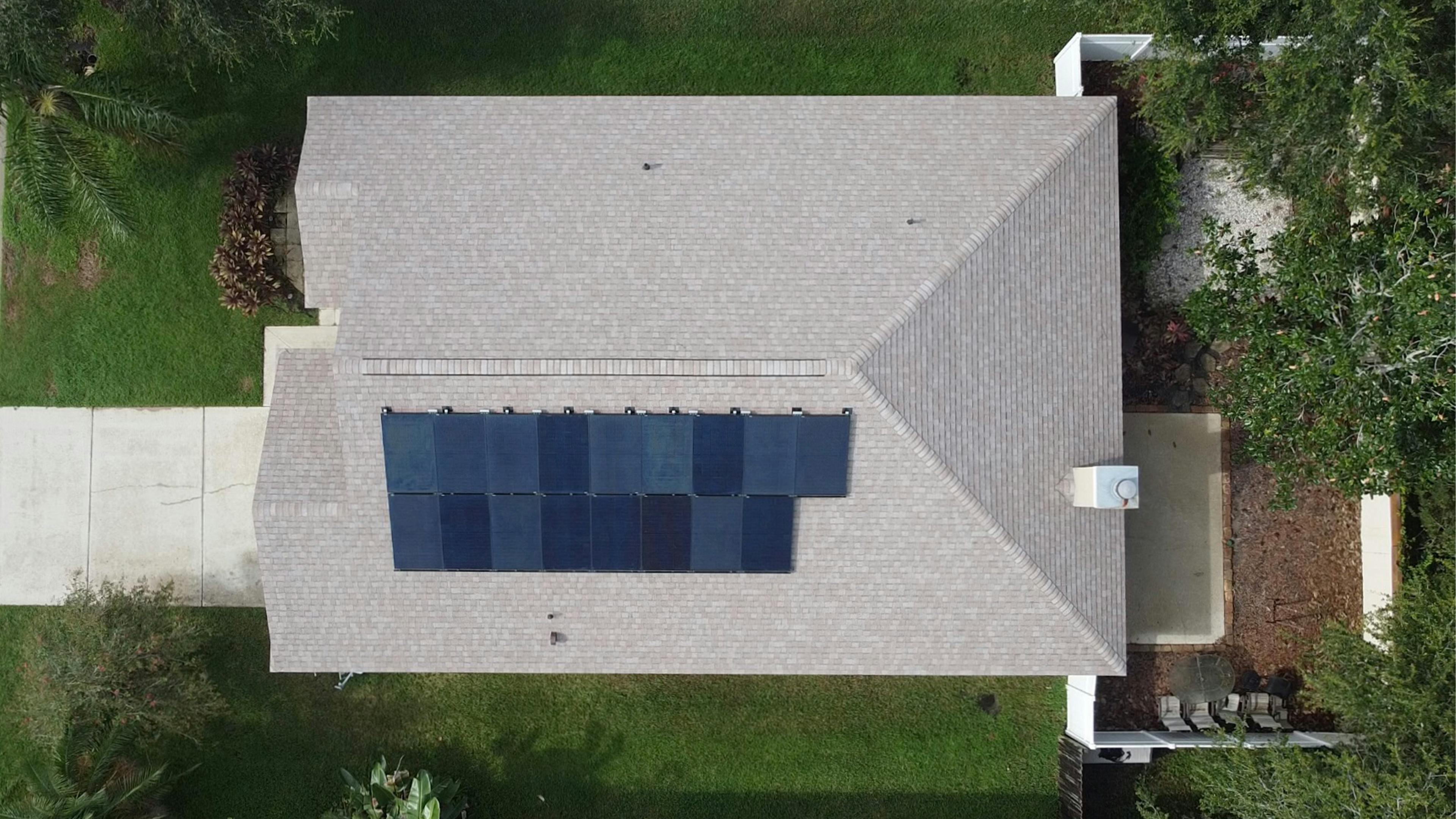 photo of a house with solar panels