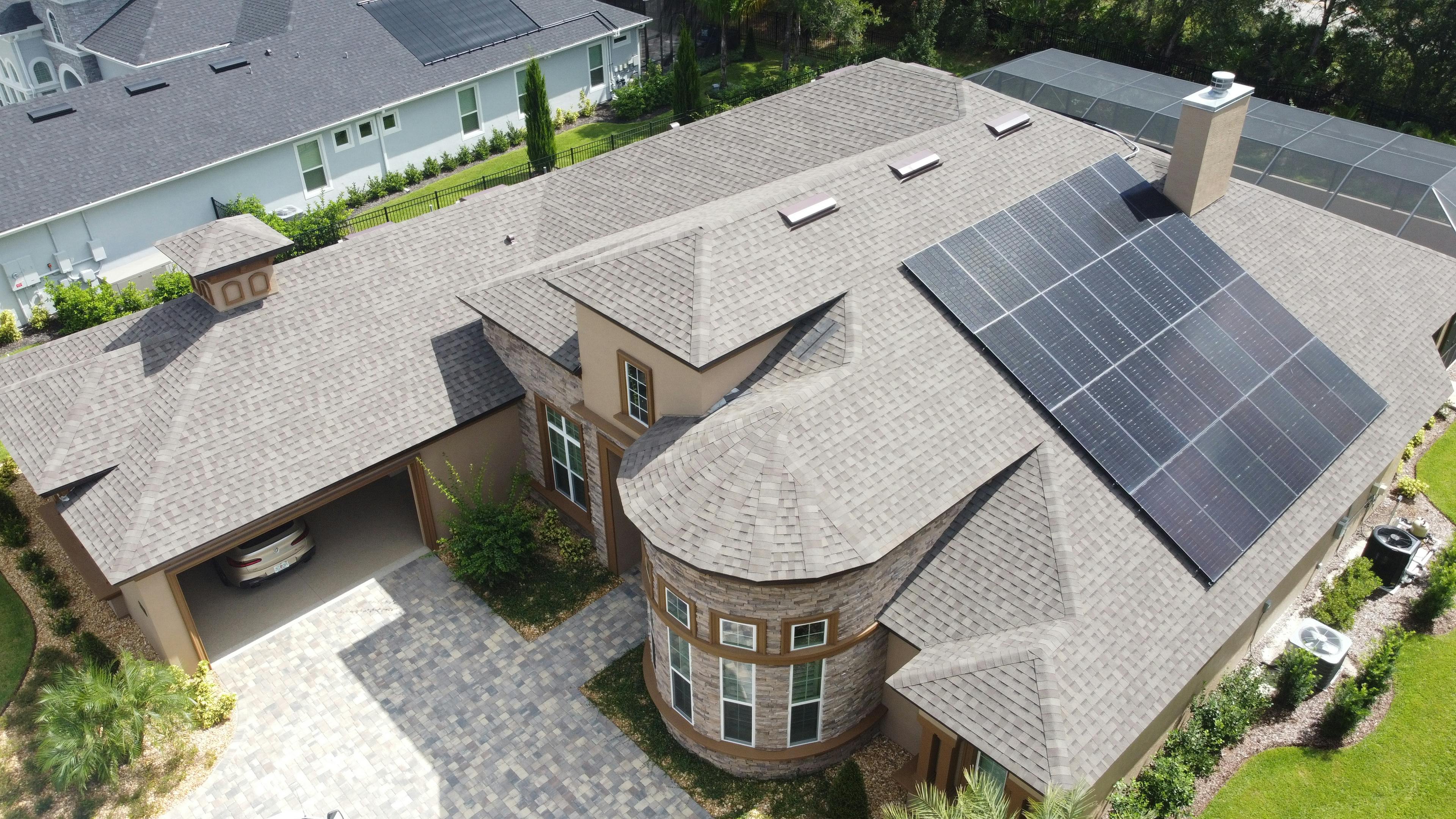 photo of a house with solar panels